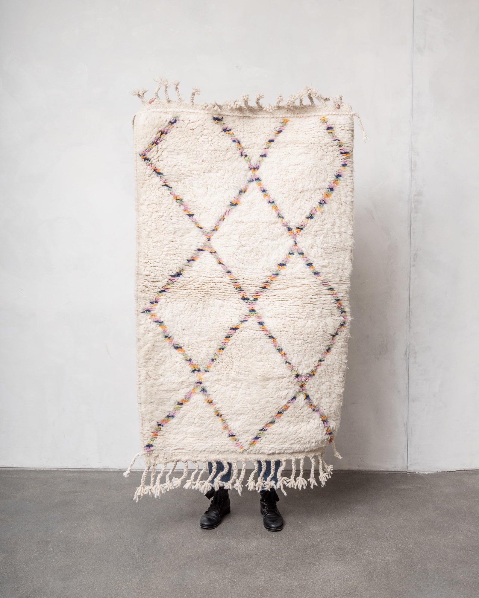 Modern, designer, handcrafted Berber rug from Morocco. Beniourain carpet with beautiful colours and patterns and fluffy wool texture.